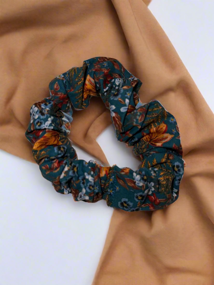 Floral patterned scrunchie on a beige background